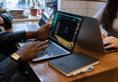 Students using their laptop in a cafe.